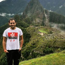 Full length of young man standing on land