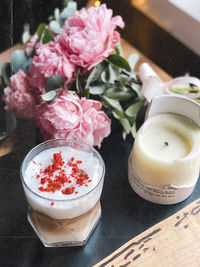 High angle view of pink roses on table