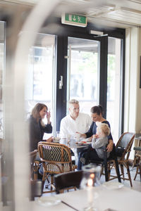 Family having coffee in cafe, vaxjo, smaland, sweden