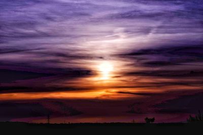 Scenic view of dramatic sky during sunset