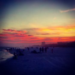 Scenic view of landscape against sky at sunset