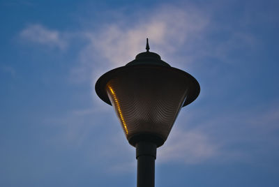 Low angle view of street light against sky