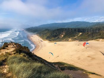 Scenic view of beach against sky