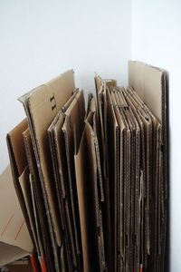 Close-up of cardboard boxes against wall