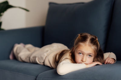 Young woman sleeping on bed at home