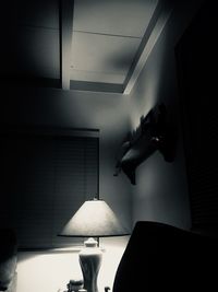 Man in illuminated room