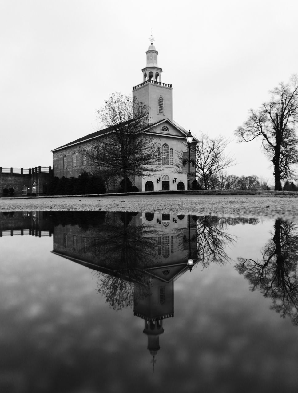 reflection, built structure, architecture, building exterior, water, waterfront, puddle, sky, standing water, tree, outdoors, lake, no people, day