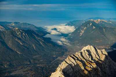 Scenic view of snowcapped mountains against sky