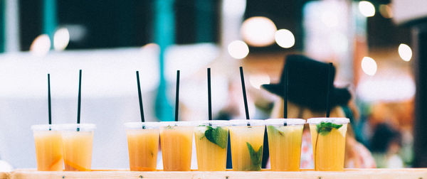 Close up of drinks in disposable glasses