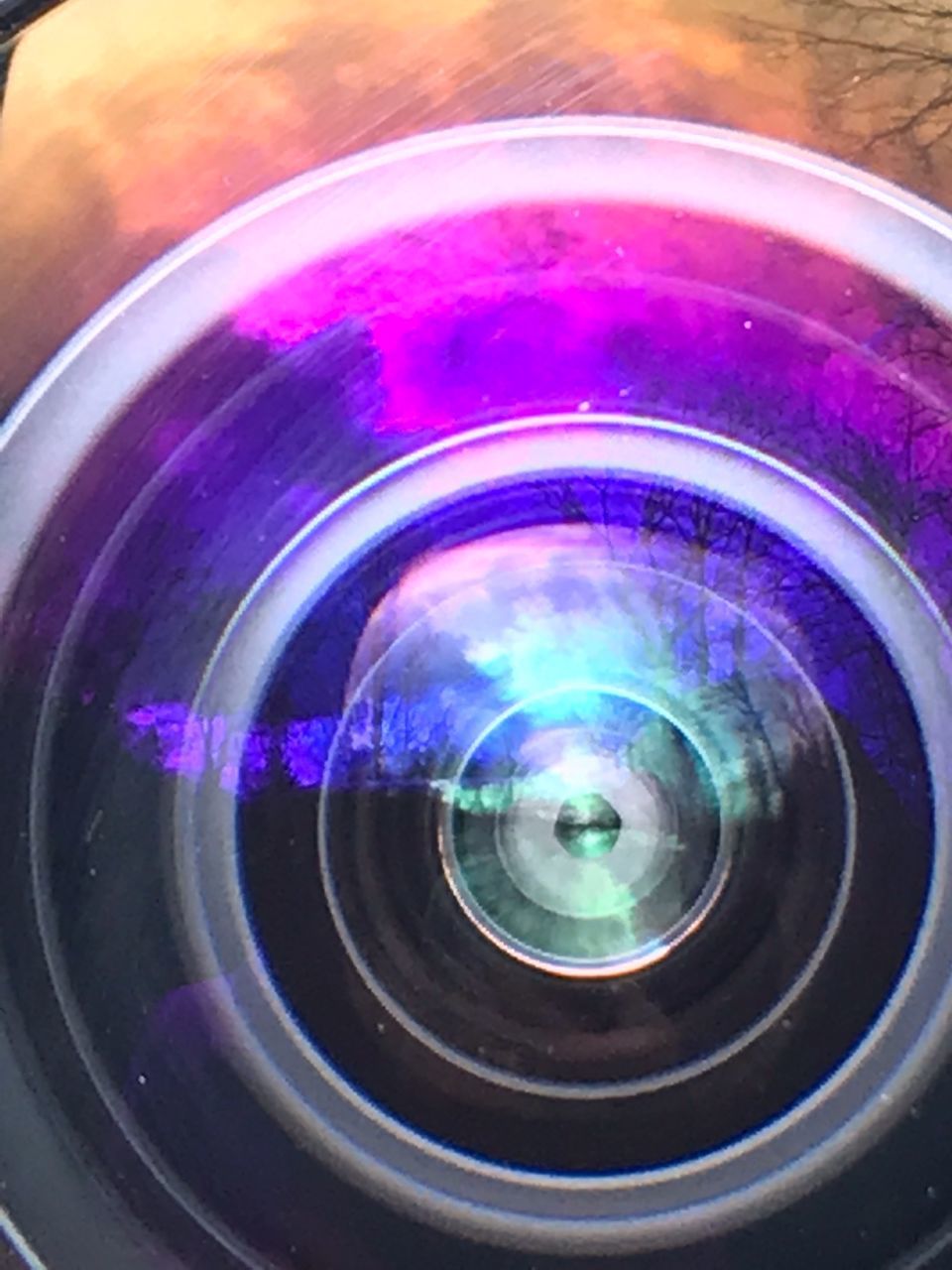 CLOSE-UP OF CAMERA ON GLASS