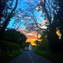 Empty road at sunset