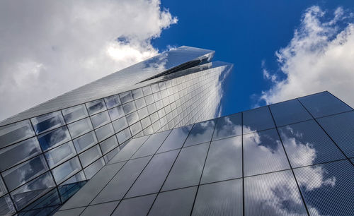 Low angle view of modern building against sky