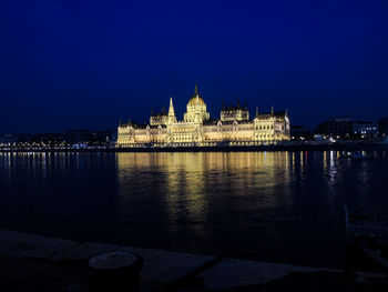 Illuminated buildings in city at night