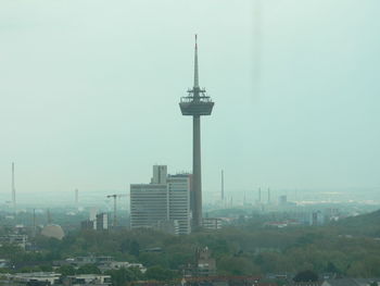 Modern buildings in city against sky