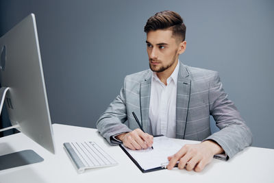 Businesswoman working at desk in office