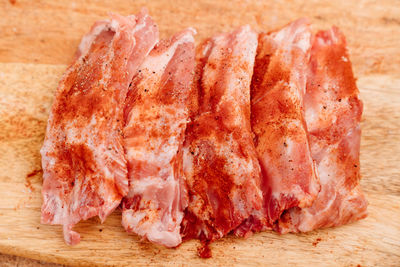 Close-up of meat on cutting board