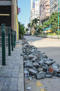 Street amidst buildings in city against sky