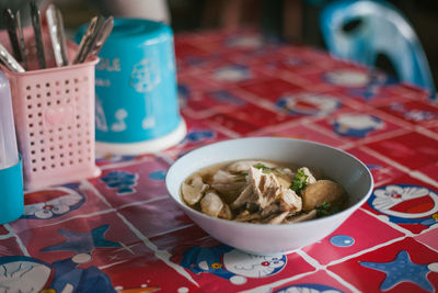 Close-up of food served on table