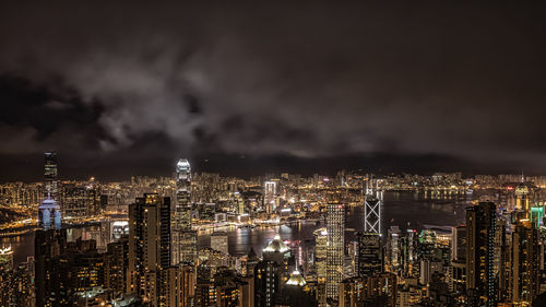 Aerial view of illuminated cityscape at night