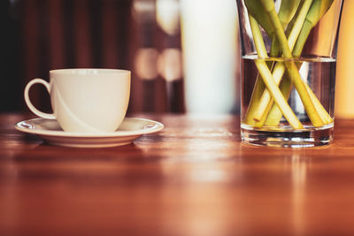 Close-up of coffee cup on table