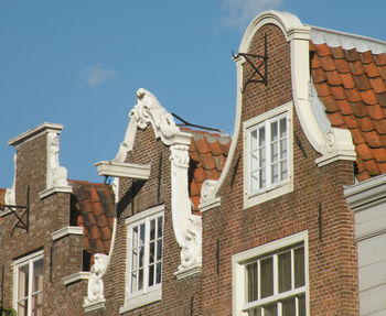 Low angle view of buildings against clear sky