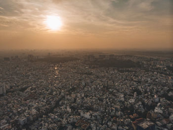 High angle view of townscape against sky during sunset