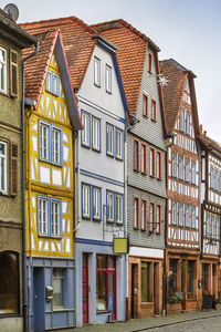 Street with historical half-timbered house in budingen, hesse, germany