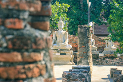 Statue against temple