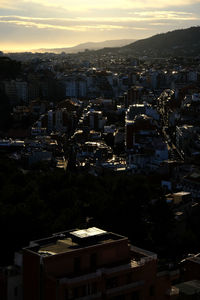 High angle view of townscape against sky at sunset