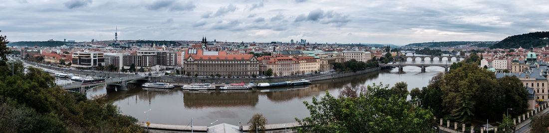 High angle view of river amidst buildings in city