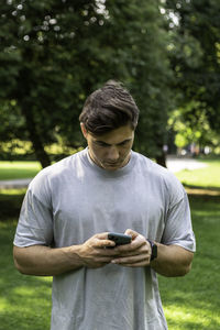 Young man using smart phone