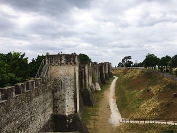 Old ruins against cloudy sky