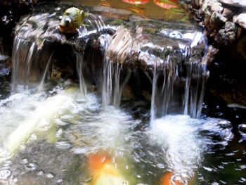 Close-up of waterfall against blurred background