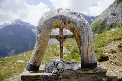 Stone structure on mountain against sky