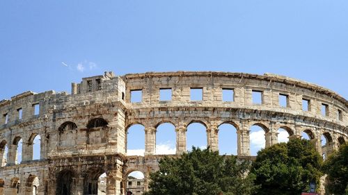 Low angle view of historical building against sky