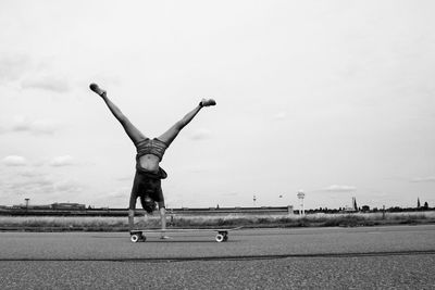 Woman doing handstand