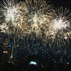 Low angle view of firework display