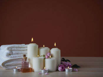 Close-up of candles on table