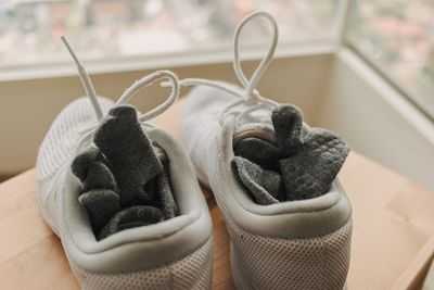 Close-up of shoes on table