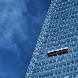 Low angle view of built structure against blue sky