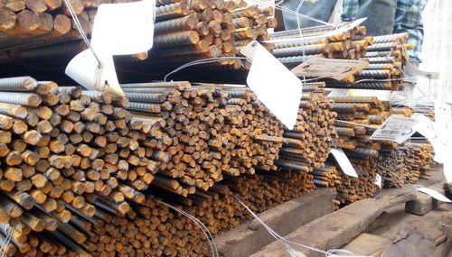 Stack of firewood for sale at market