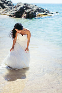 Full length of child standing on beach