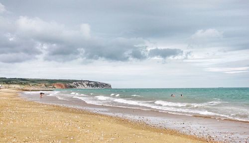 Scenic view of beach against sky