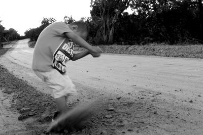 Child playing on dirt