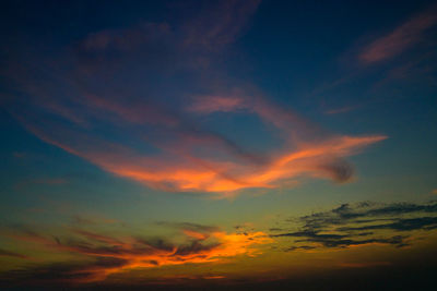 Low angle view of dramatic sky during sunset