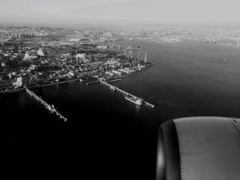 High angle view of airplane flying over river