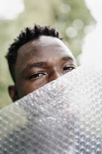 Young african american man portrait. plastic pollution, mental health concept