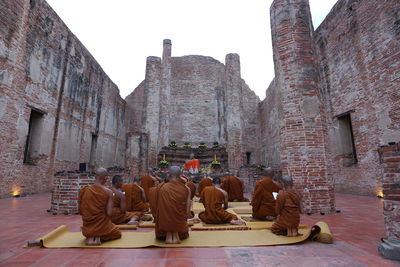 Rear view of people at temple