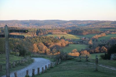 Scenic view of landscape against sky during autumn