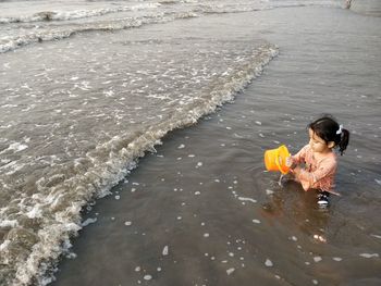 High angle view of woman on beach